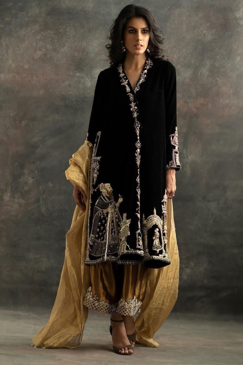 Pure Velvet Kurt With Mughal Embossed Embroidery Contrasted With Golden Pants