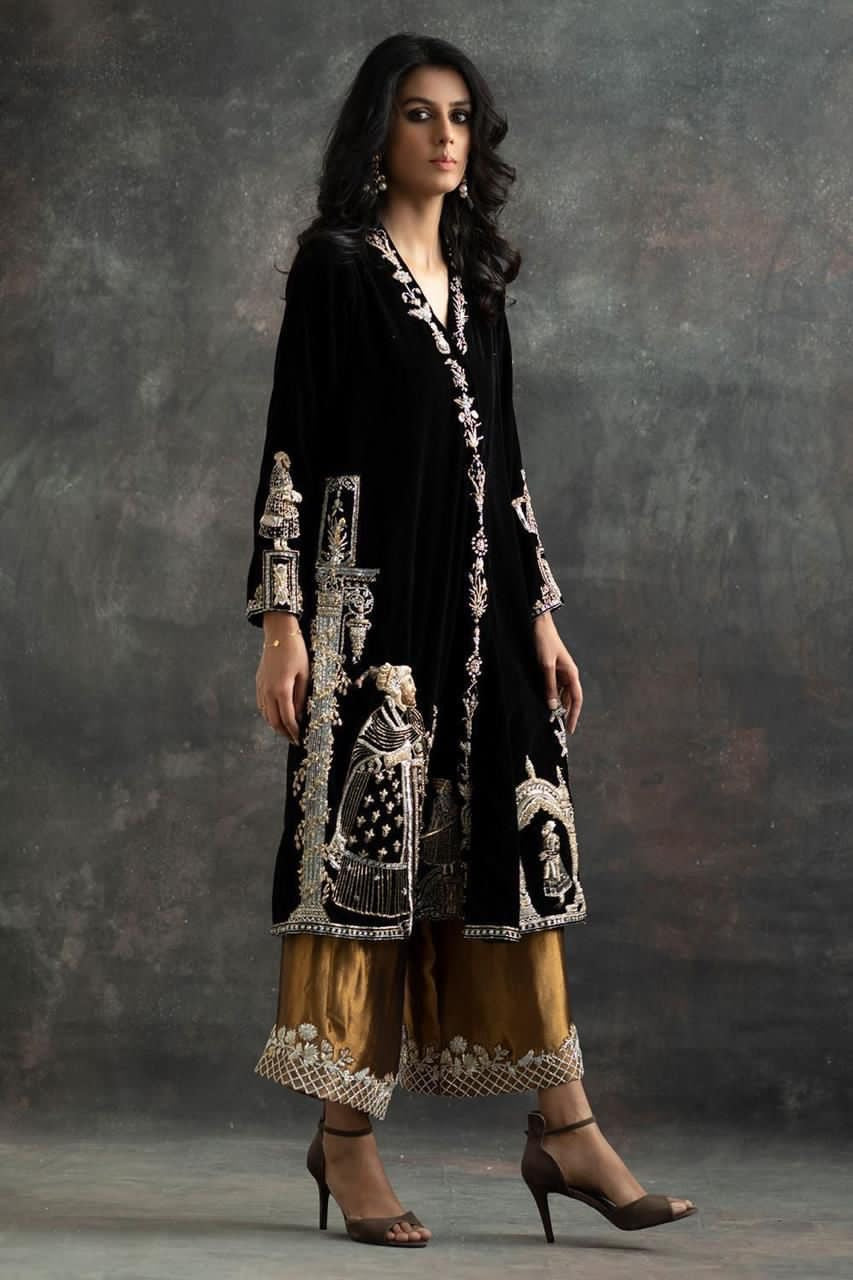 Pure Velvet Kurt With Mughal Embossed Embroidery Contrasted With Golden Pants